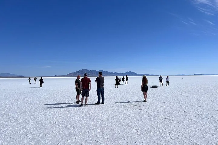 Group of tourists standing on the Bonneville Salt Flats